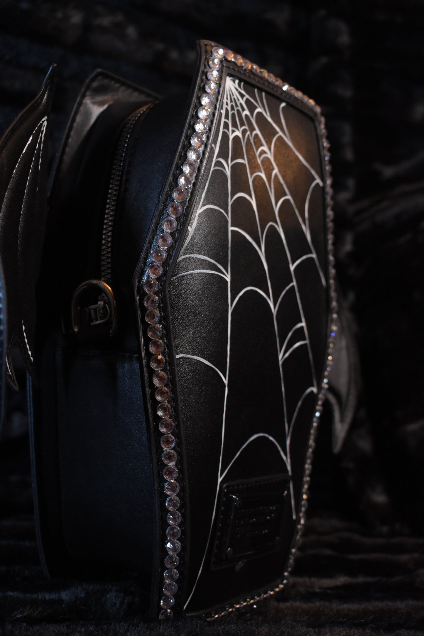 Spider web coffin purse