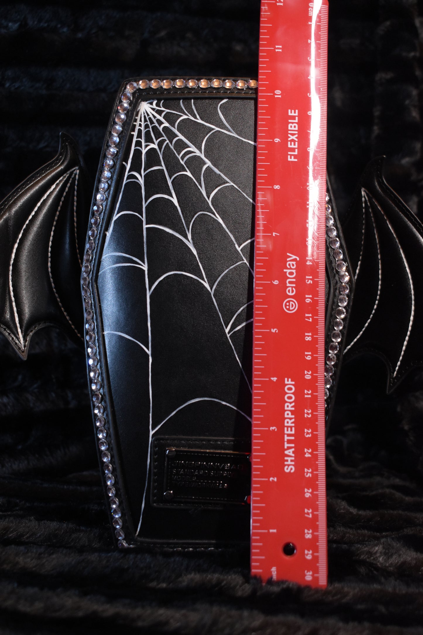 Spider web coffin purse