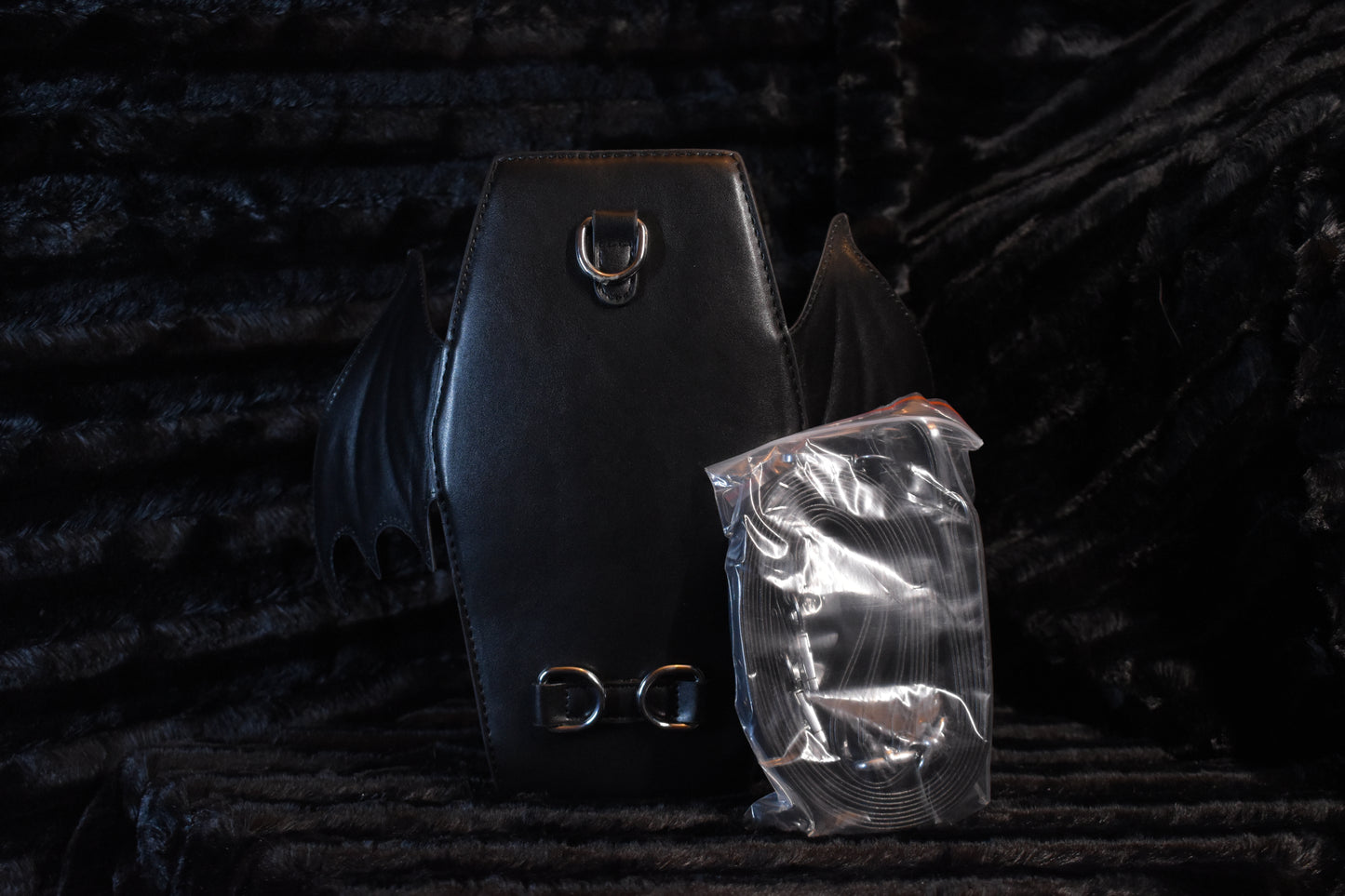 Spider web coffin purse