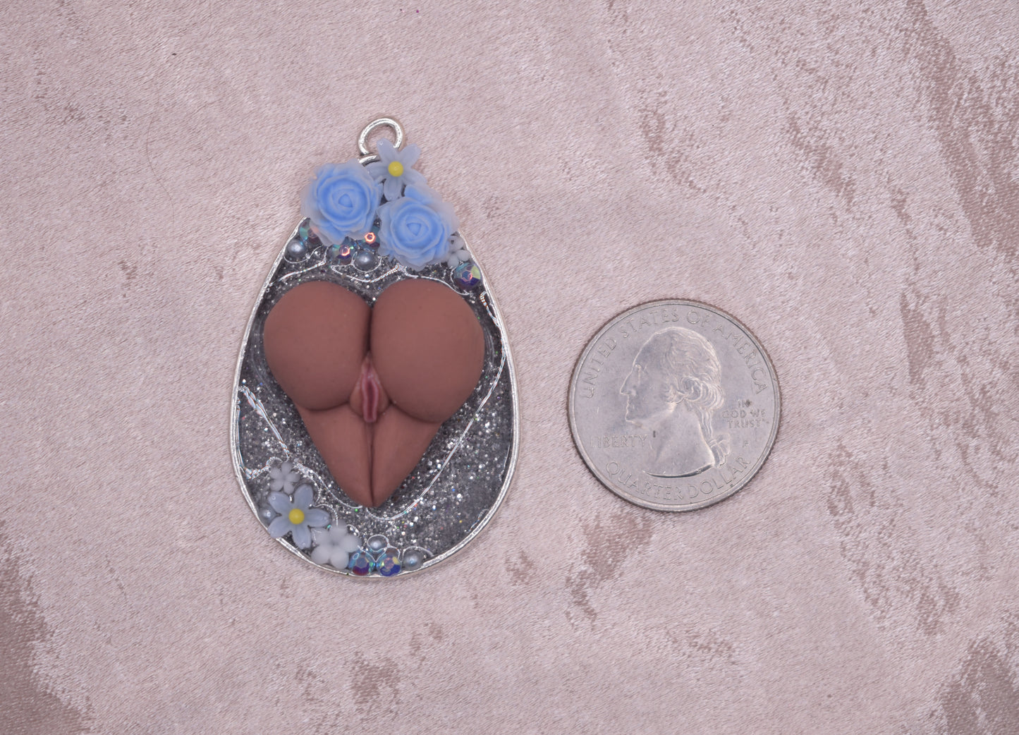 Silver booty pendant