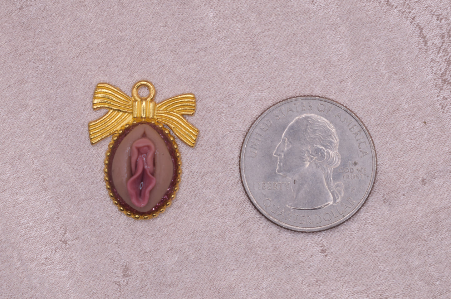 Gold bow vagina pendant