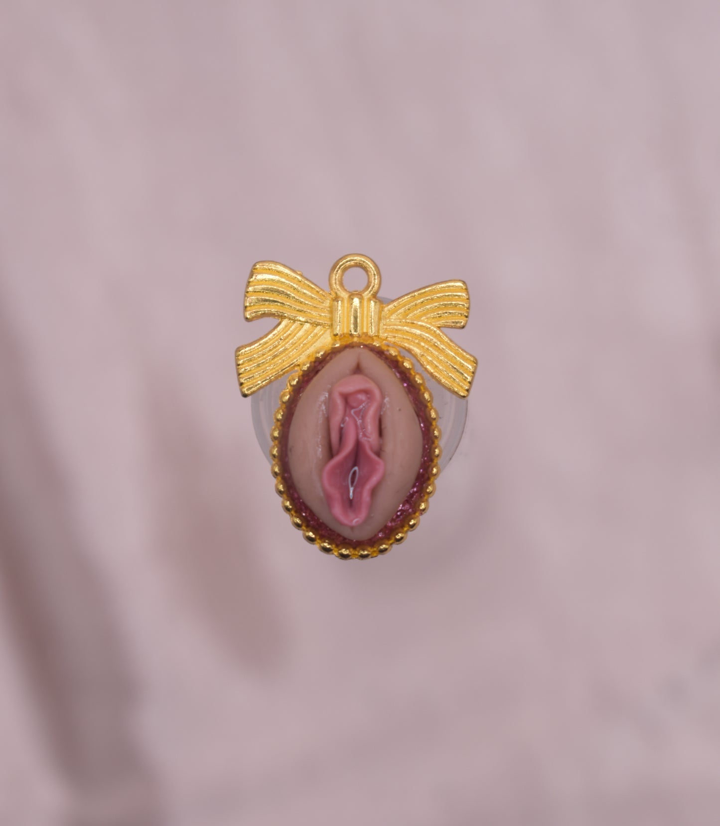 Gold bow vagina pendant