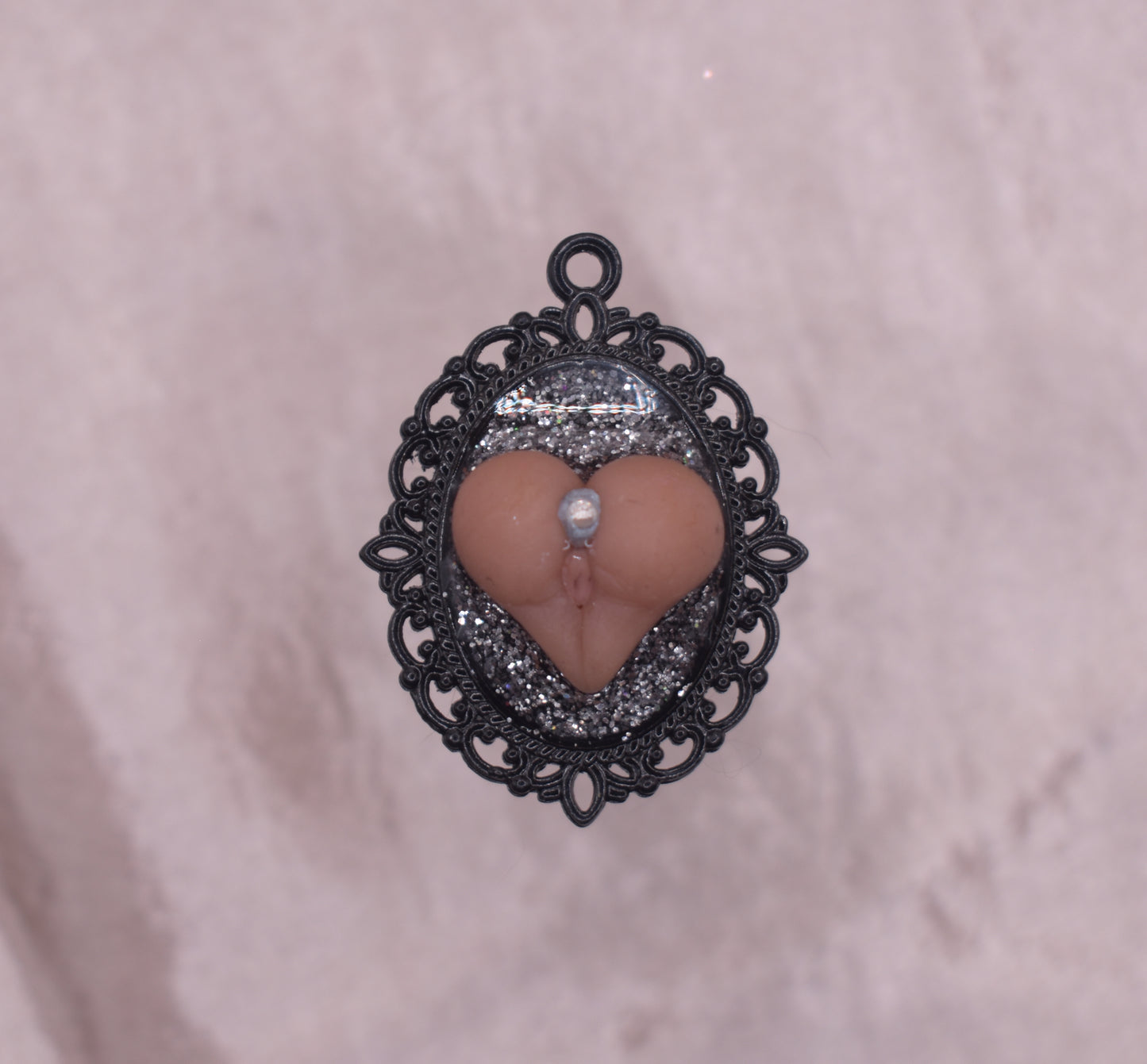 Grey glitter booty pendant