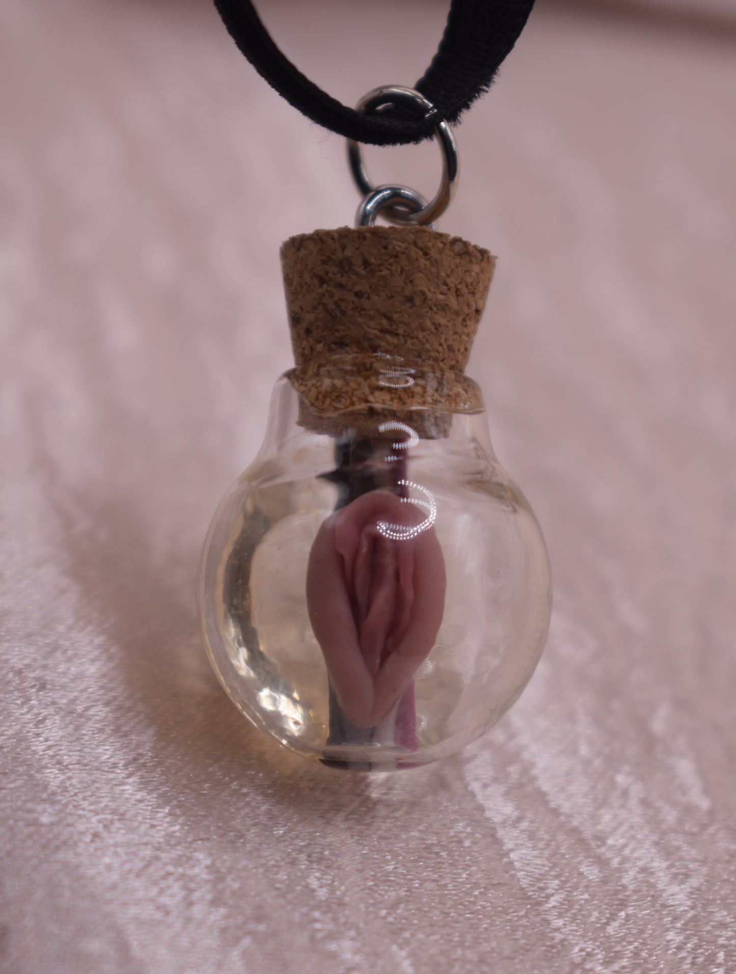 Asexual vagina globe pendant