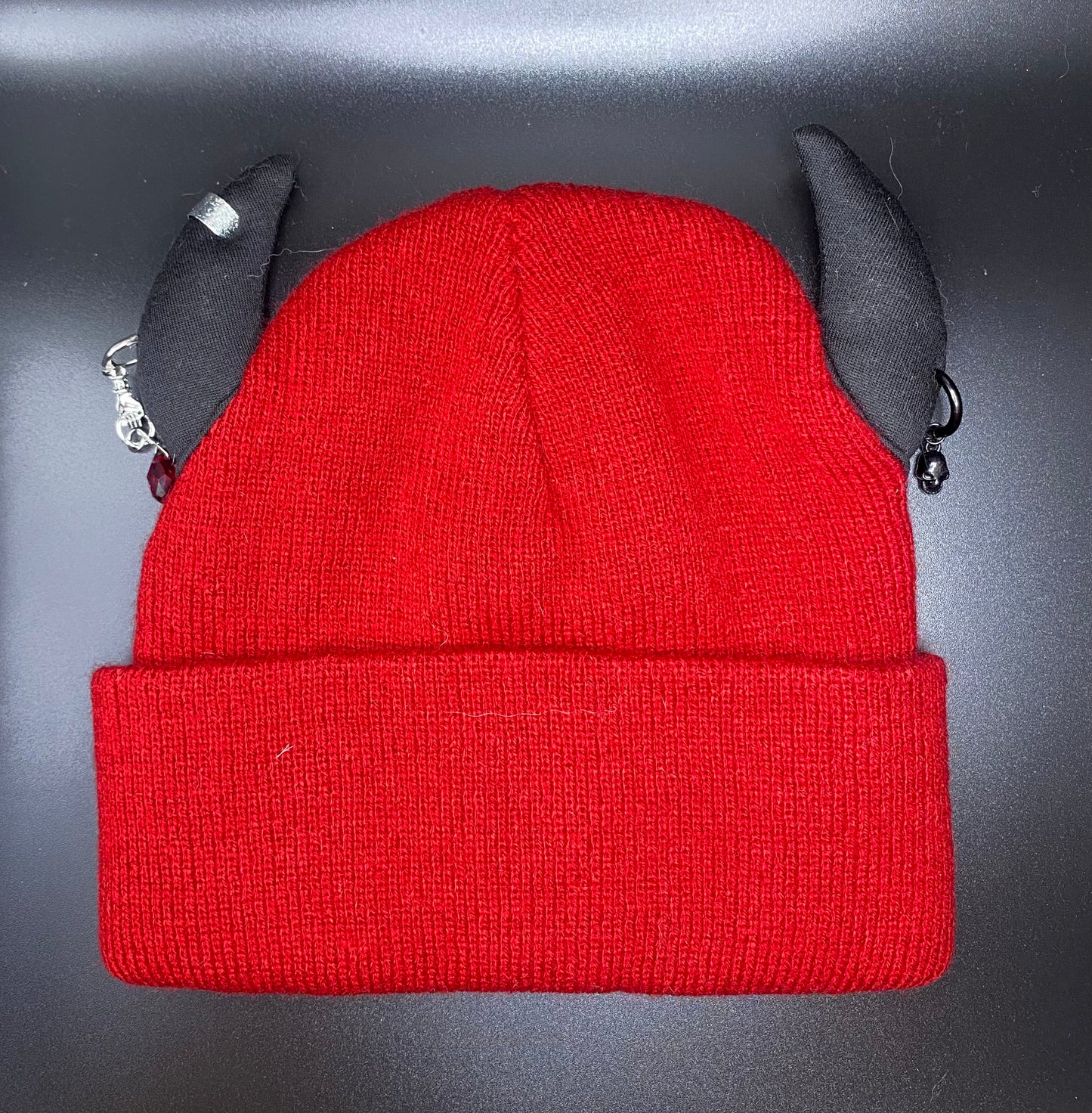 Red dino horned beanie